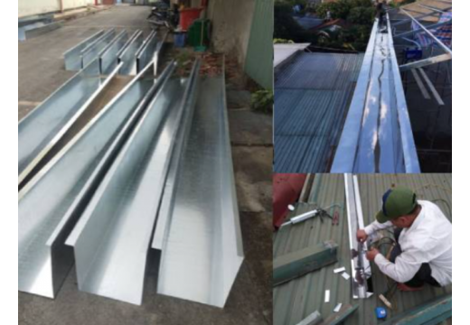 Thợ làm máng xối tại Bến Cát.